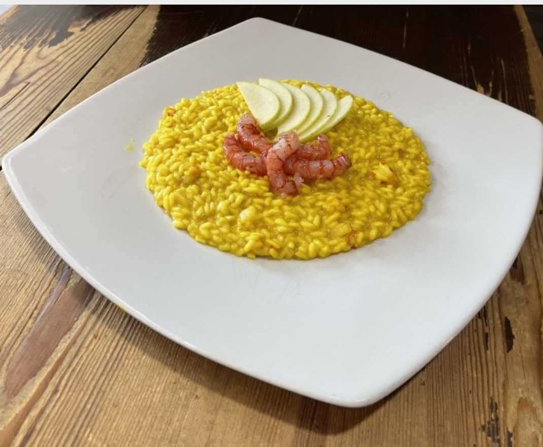 <h6 class='prettyPhoto-title'>Risotto mit roten Garnelen, Kurkuma, grünem Apfel und Zitronenschale</h6>