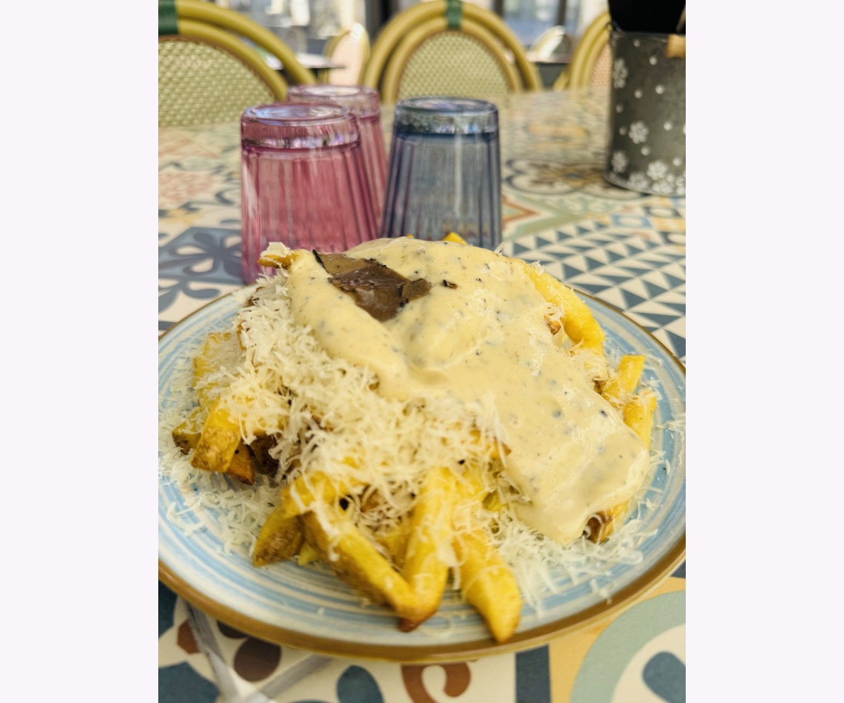 <h6 class='prettyPhoto-title'>Frites parmesan affiné, Mayonnaise à la Truffe. 250g de plaisir.</h6>