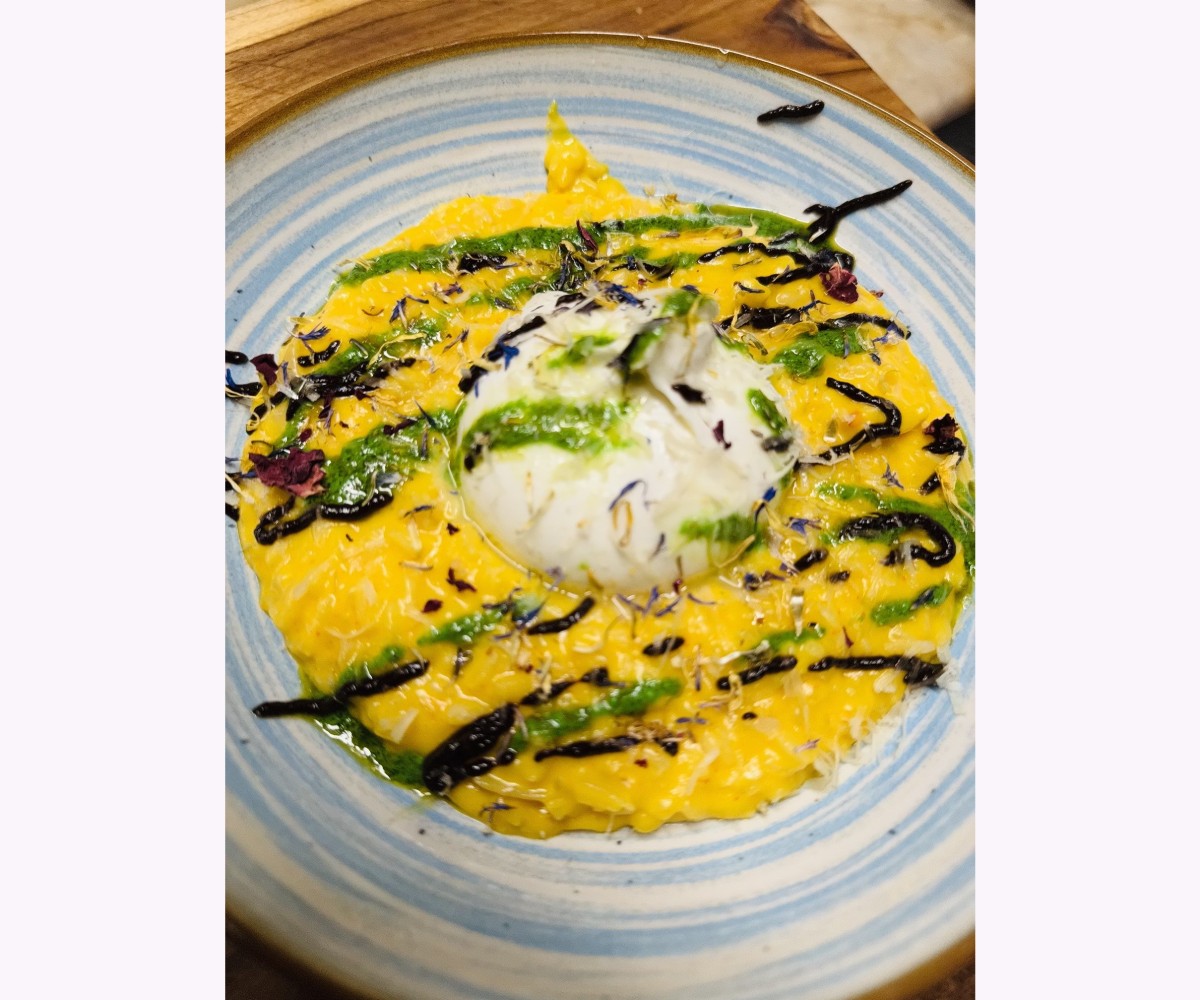 <h6 class='prettyPhoto-title'>Risotto végé buratta, potimarrons, bleué, pesto, ail noir</h6>