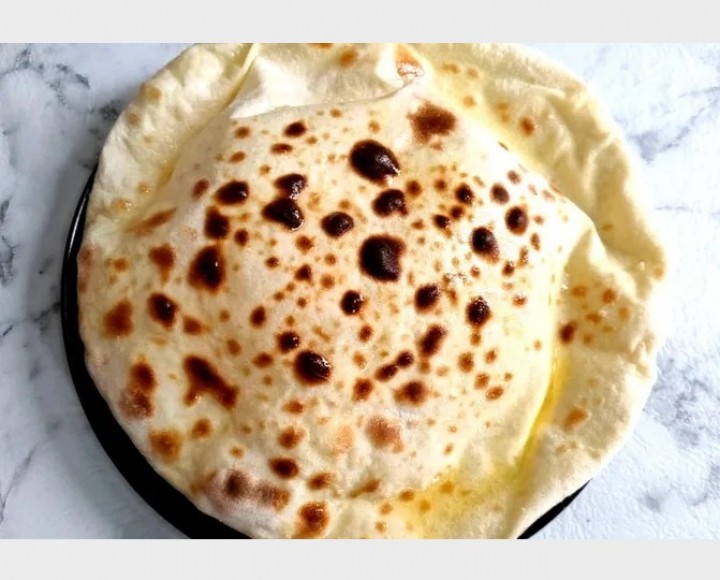 <h6 class='prettyPhoto-title'>Naan with butter</h6>