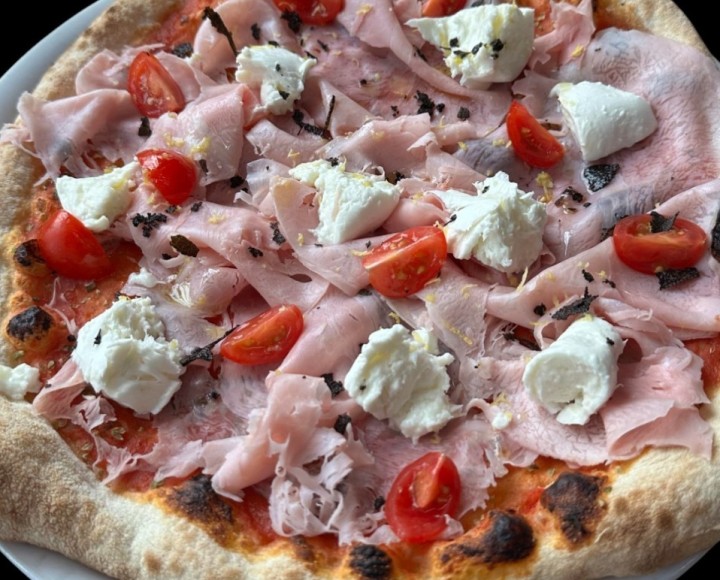 <h6 class='prettyPhoto-title'>Pizza du moment (suggestion du chef)</h6>