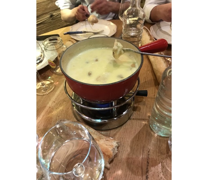 <h6 class='prettyPhoto-title'>Savoyard fondue for mountain people with porcini mushrooms</h6>